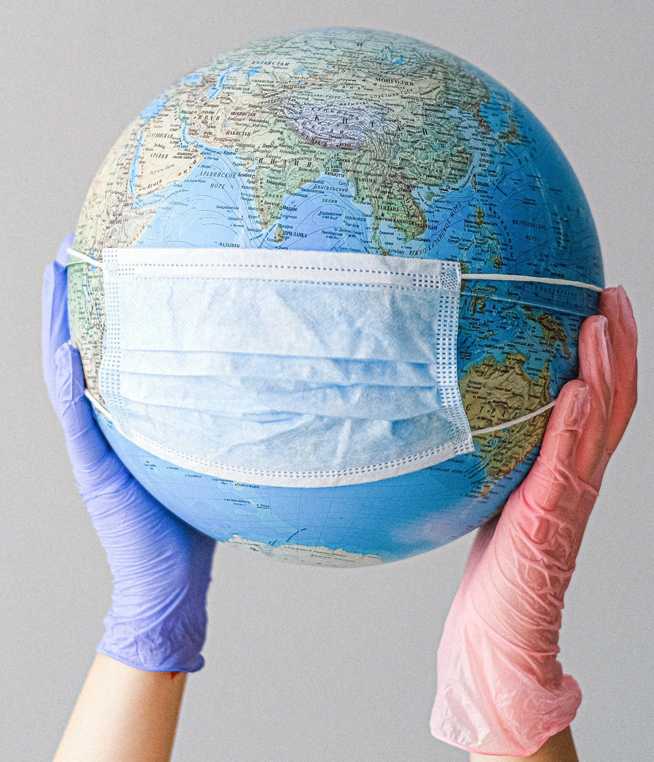 Earth covered in a covid mask